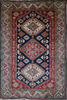 Kazak Blue Hand Knotted 67 X 99  Area Rug 700-109694 Thumb 0