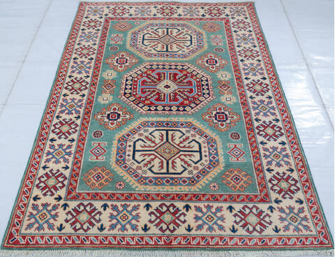 Kazak Green Hand Knotted 310 X 59 Area Rug 700-147535 Image 1